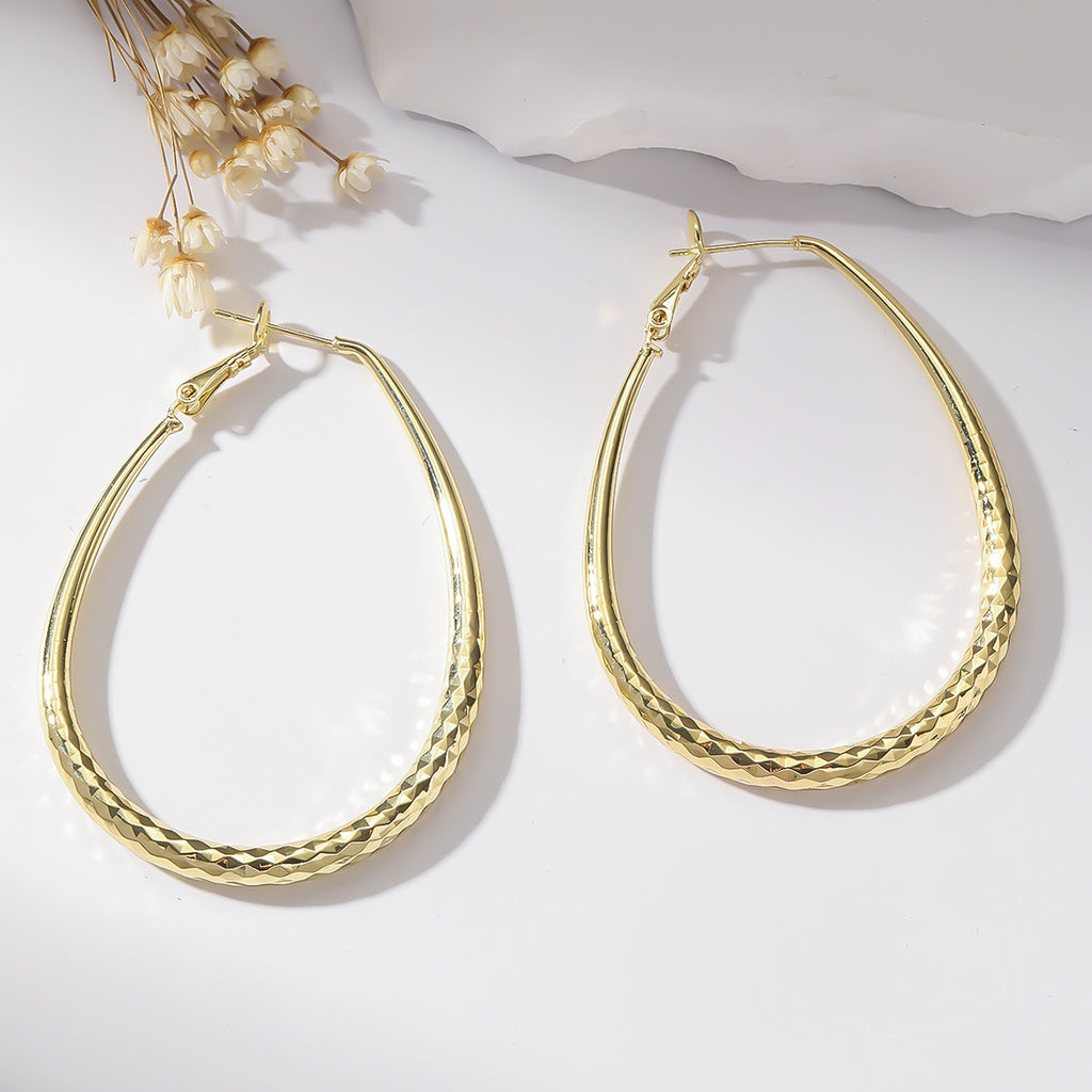 Golden Egg-Shaped Earrings